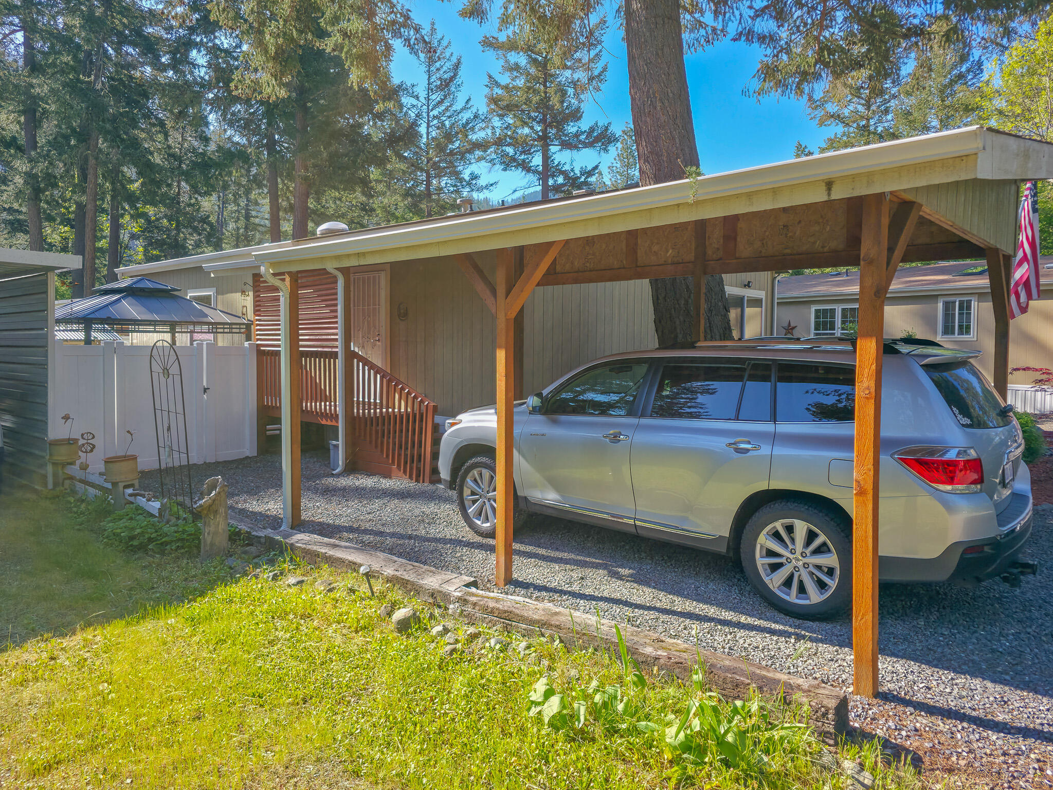 537 Thompson Creek Road, Unit 16 Jacksonville, OR 97530 - Photo 26 of 30 a view of a car park in front of a house