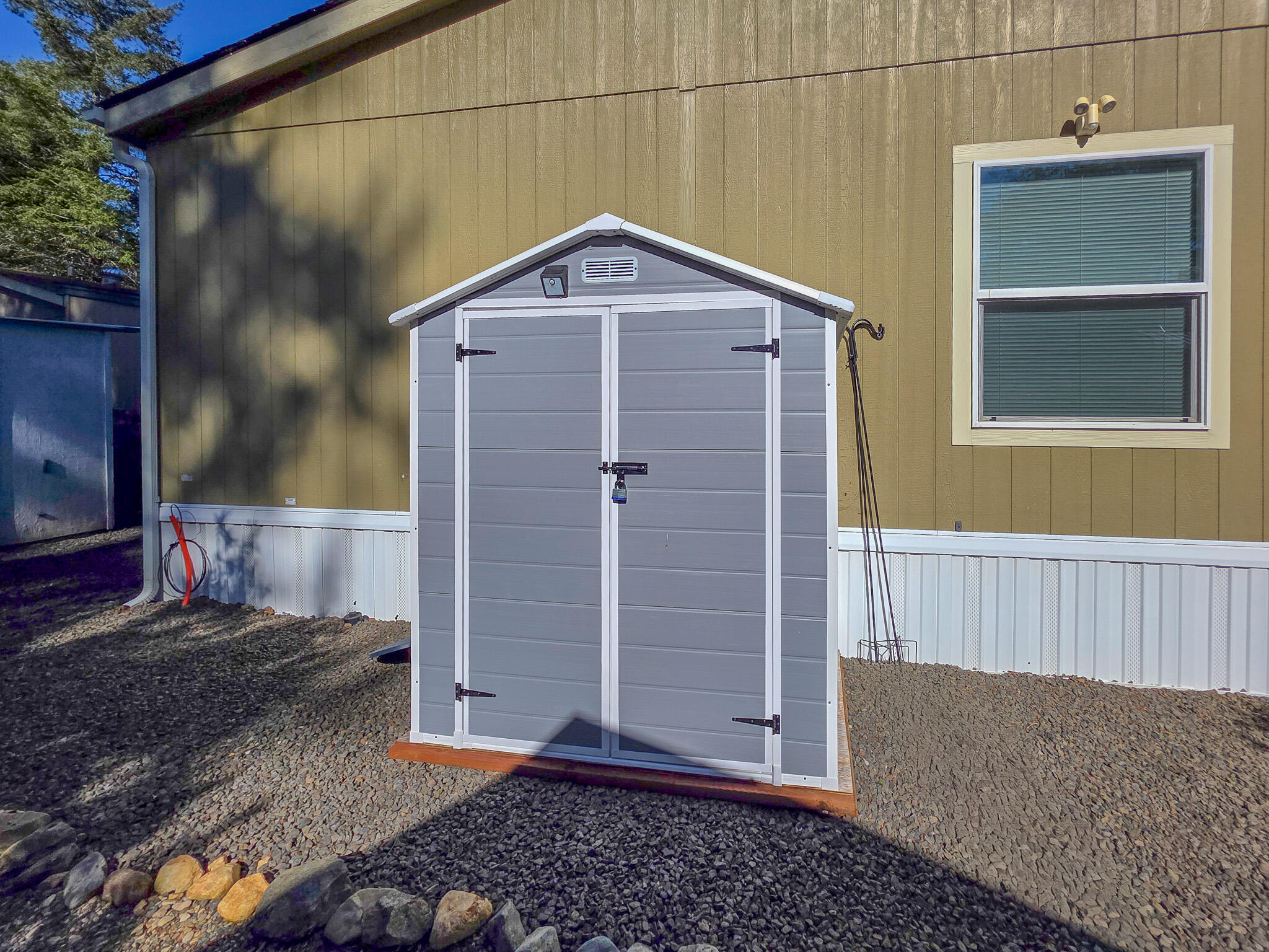 537 Thompson Creek Road, Unit 16 Jacksonville, OR 97530 - Photo 28 of 30 a view of a house with a wooden door
