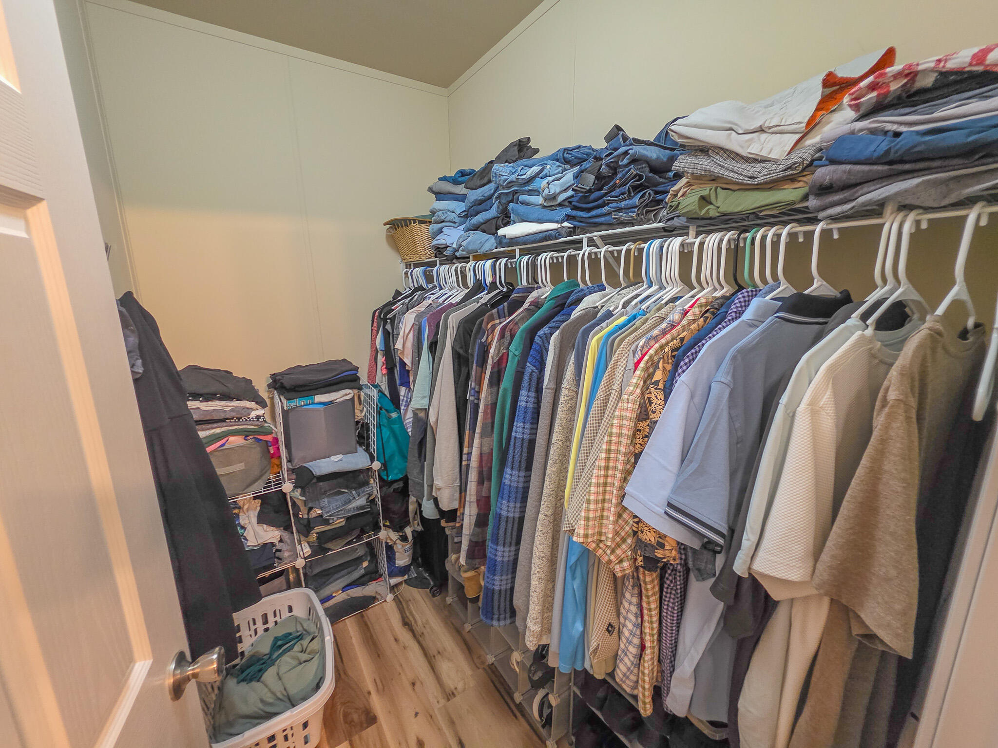537 Thompson Creek Road, Unit 16 Jacksonville, OR 97530 - Photo 9 of 30 a view of walk in closet with clothes and shoes