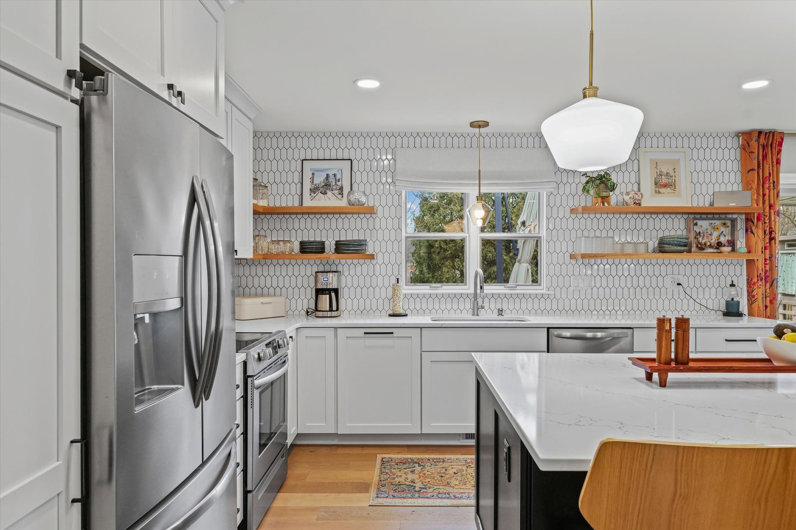 2504 Branch Road Champaign, IL 61822 - Photo 19 of 52 a kitchen with stainless steel appliances granite countertop a sink refrigerator and microwave