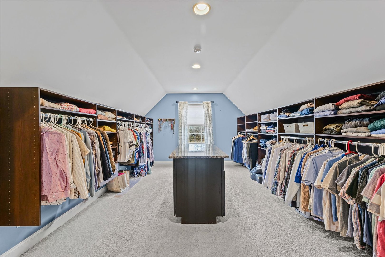 2504 Branch Road Champaign, IL 61822 - Photo 35 of 52 a view of walk in closet with clothes and shoes