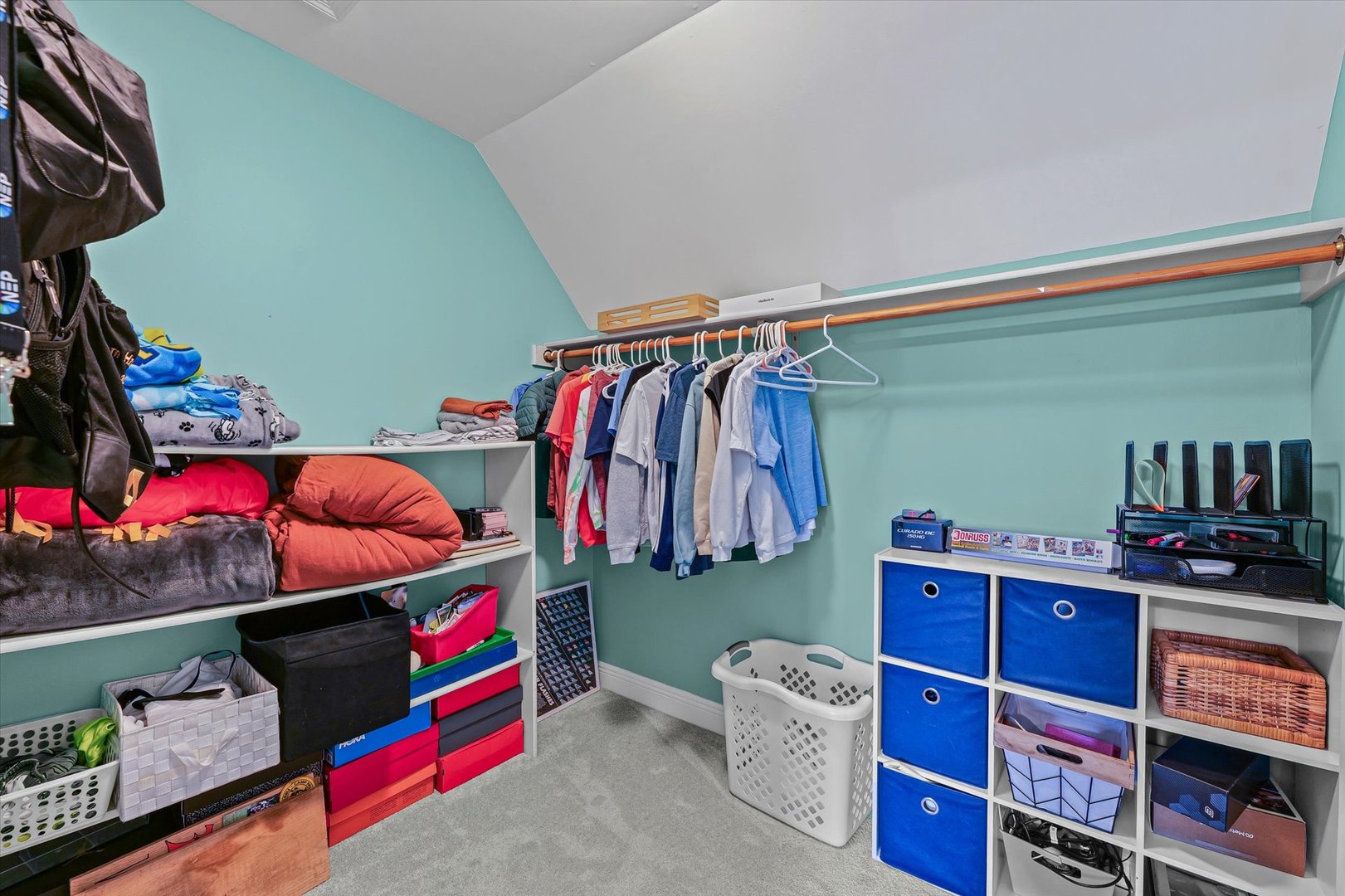 2504 Branch Road Champaign, IL 61822 - Photo 39 of 52 a room with lots of different colored cloths