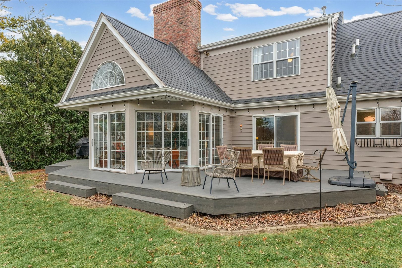 2504 Branch Road Champaign, IL 61822 - Photo 50 of 52 a front view of a house with a yard and outdoor seating