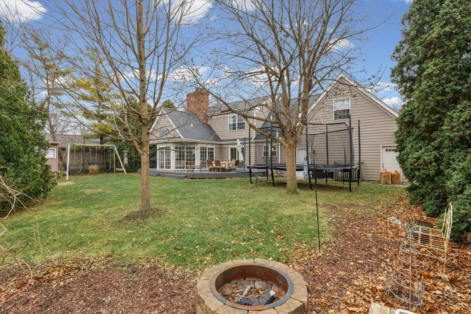 2504 Branch Road Champaign, IL 61822 - Photo 51 of 52 a front view of a house with a garden and trees