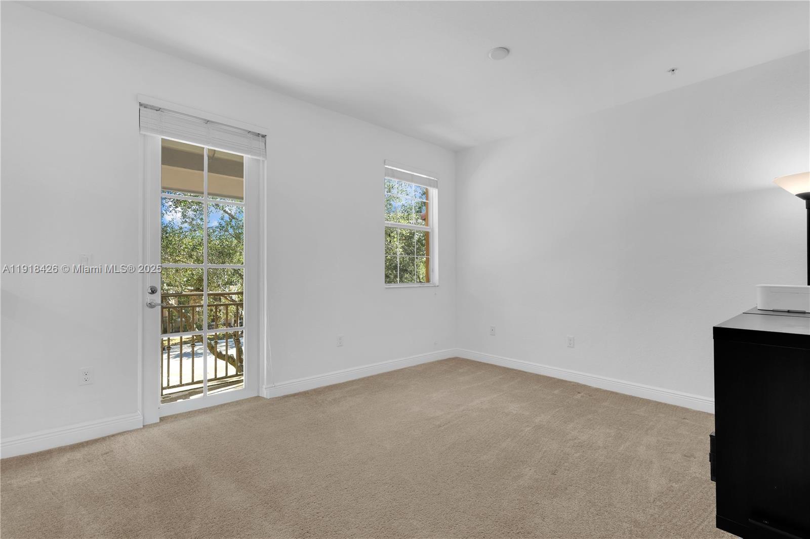 1516 Southwest 147th Avenue Pembroke Pines, FL 33027 - Photo 11 of 29 an empty room with windows