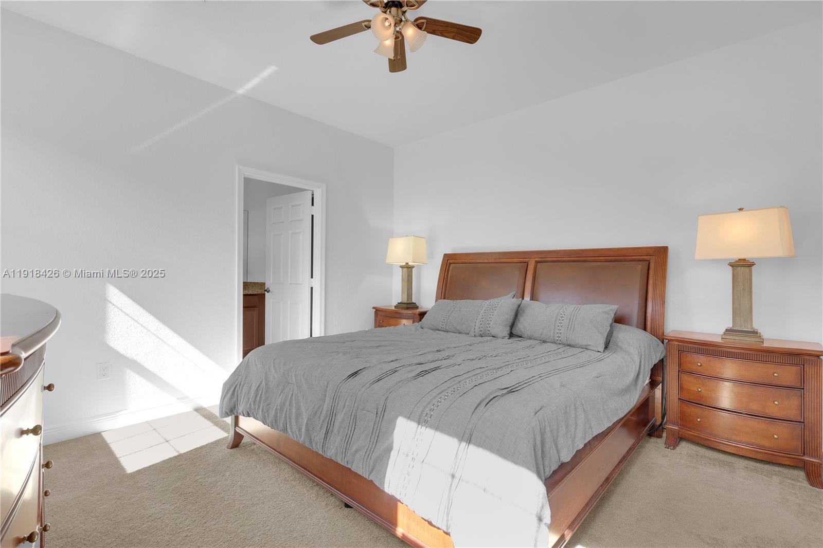 1516 Southwest 147th Avenue Pembroke Pines, FL 33027 - Photo 17 of 29 a bedroom with a bed and window