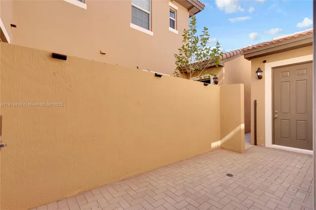 a view of a house with a garage