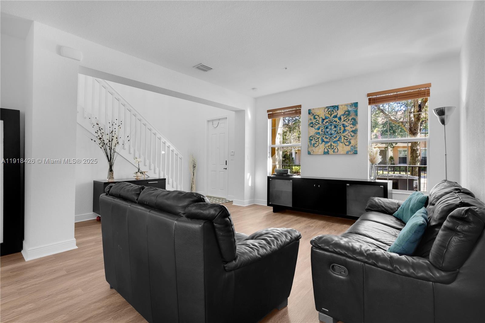 1516 Southwest 147th Avenue Pembroke Pines, FL 33027 - Photo 3 of 29 a living room with furniture and a window
