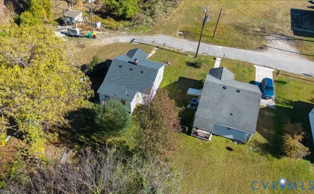 aerial view of residential house with outdoor space