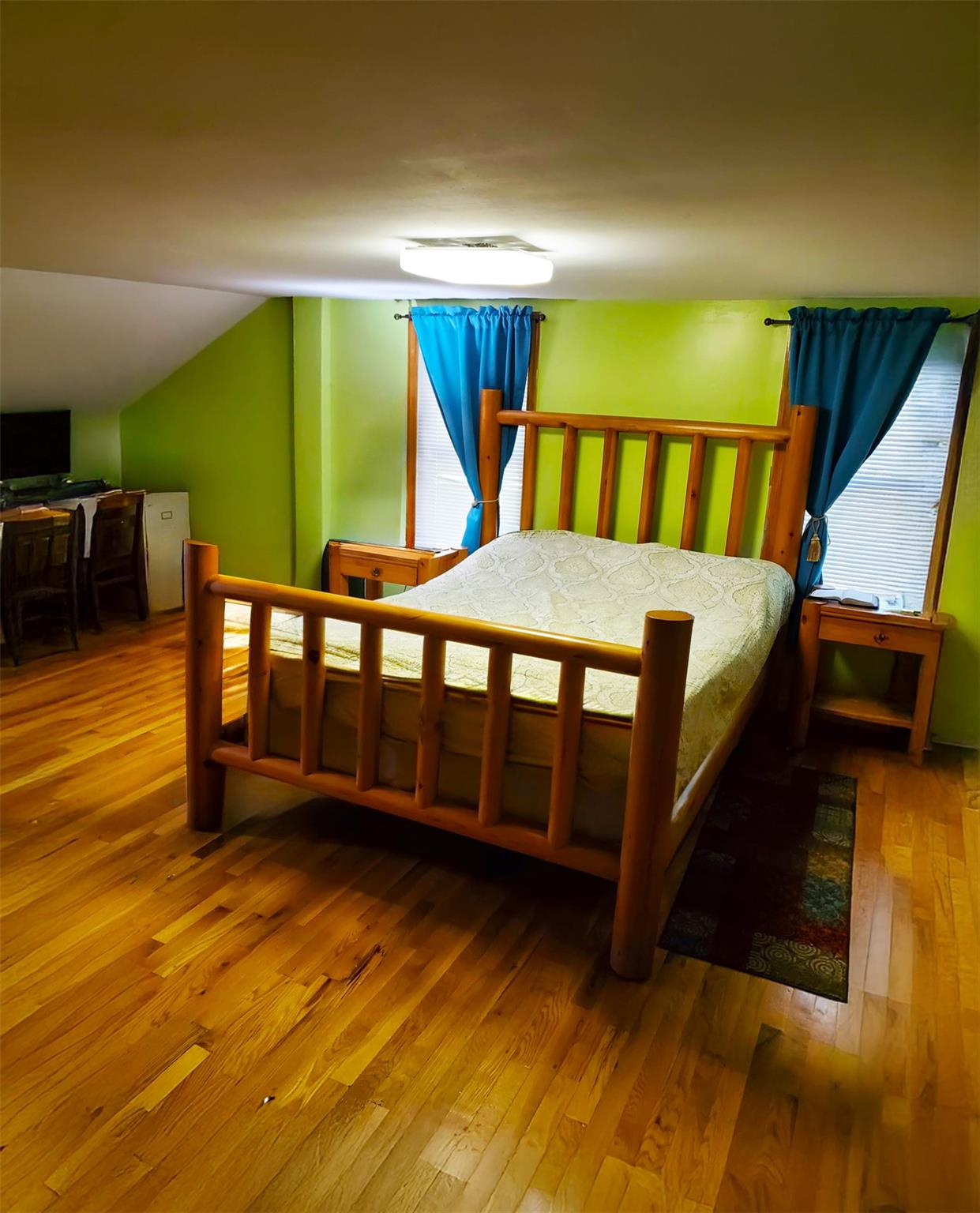 892 Bowbell Road Greene, NY 13778 - Photo 7 of 35 Bedroom with hardwood / wood-style floors and vaulted ceiling
