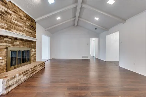 a view of a livingroom with wooden floor