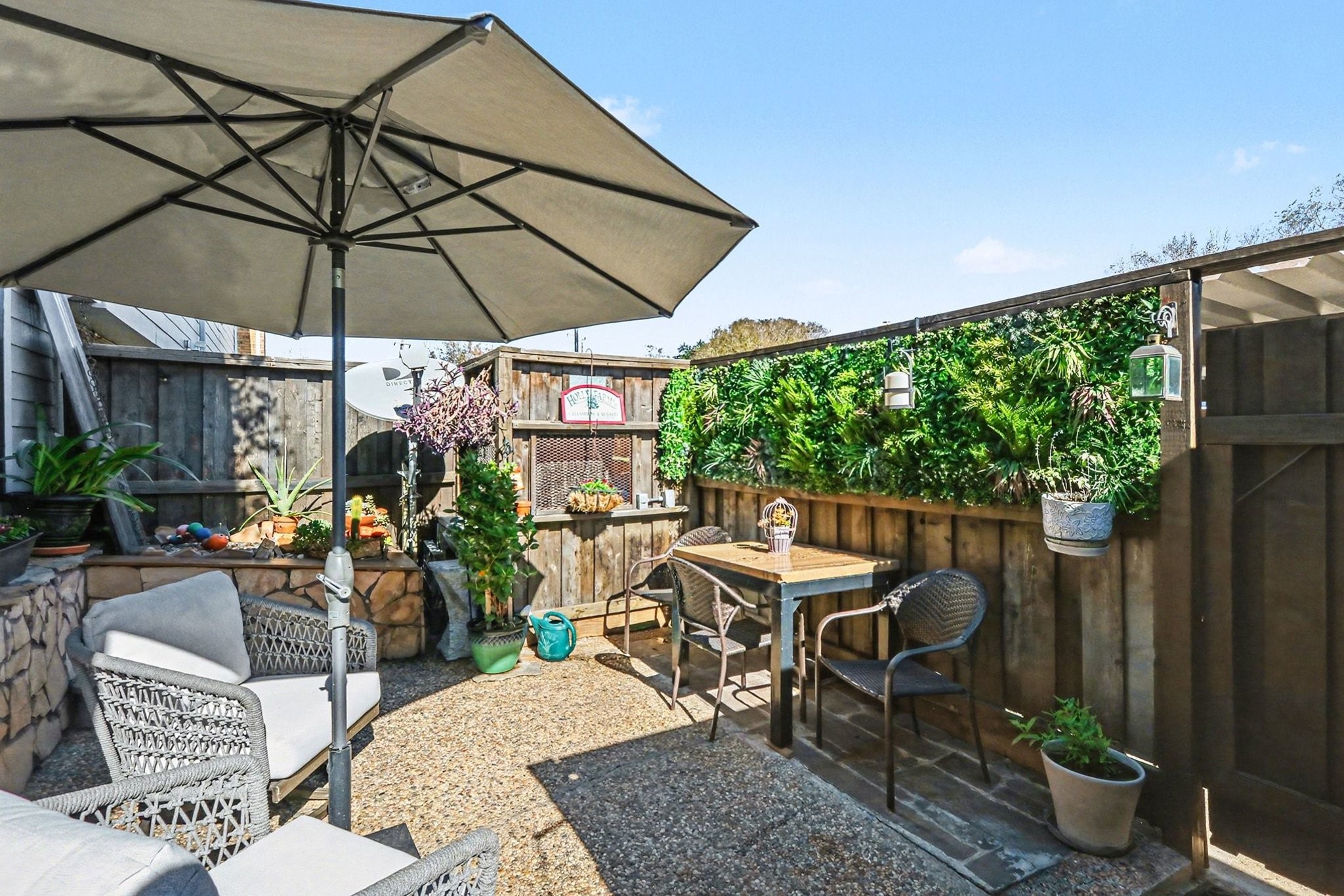 9407 Fondren Road Houston, TX 77074 - Photo 19 of 30 a view of a patio with chairs and potted plants