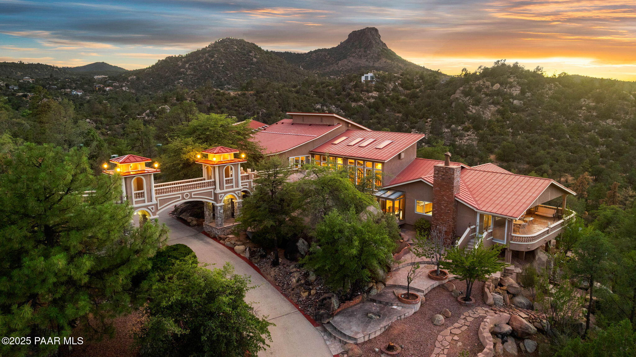 a view of house with mountain view and a mountain view in back