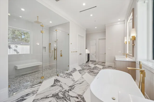 a bathroom with a bathtub and a sink