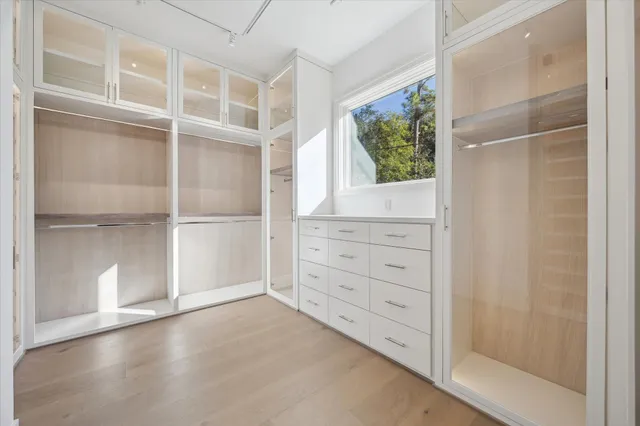 a view of an empty walk in closet