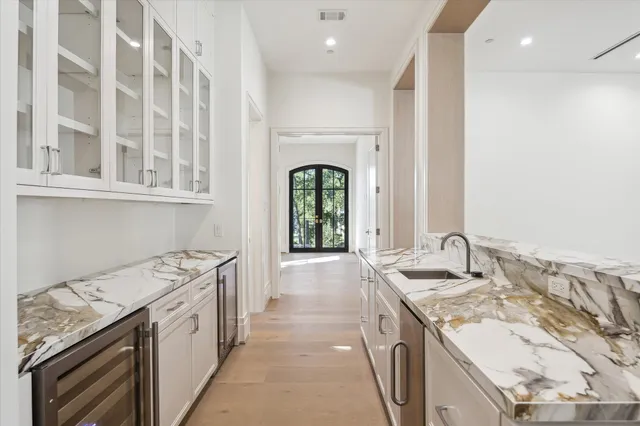 a view of a bathroom with dual sinks