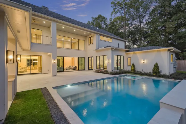 a view of a house with swimming pool