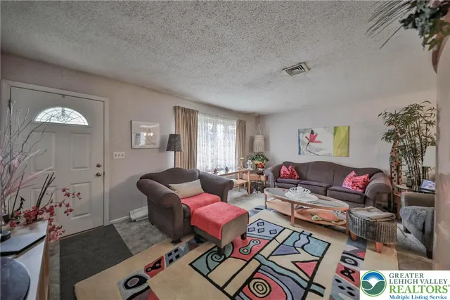 a kitchen with cabinets and stainless steel appliances