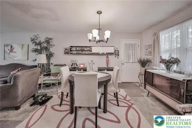 a bed room with a bed and a dresser