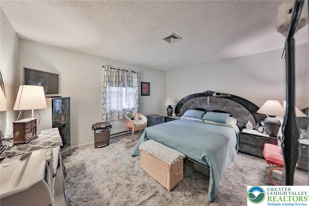 1502 2nd Street Bethlehem, PA 18020 - Photo 21 of 62 a living room with furniture a rug and a lamp