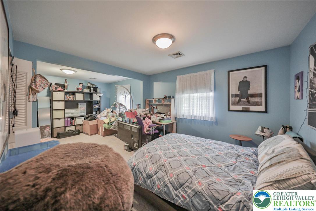 1502 2nd Street Bethlehem, PA 18020 - Photo 24 of 62 a bedroom with two beds and a large window