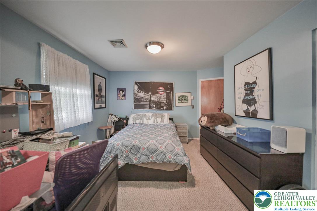 1502 2nd Street Bethlehem, PA 18020 - Photo 25 of 62 a bedroom with a bed and dresser