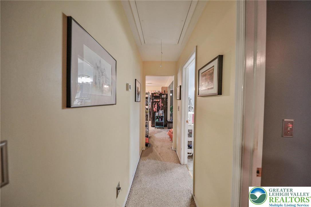 1502 2nd Street Bethlehem, PA 18020 - Photo 31 of 62 a view of a hallway with wooden shelves