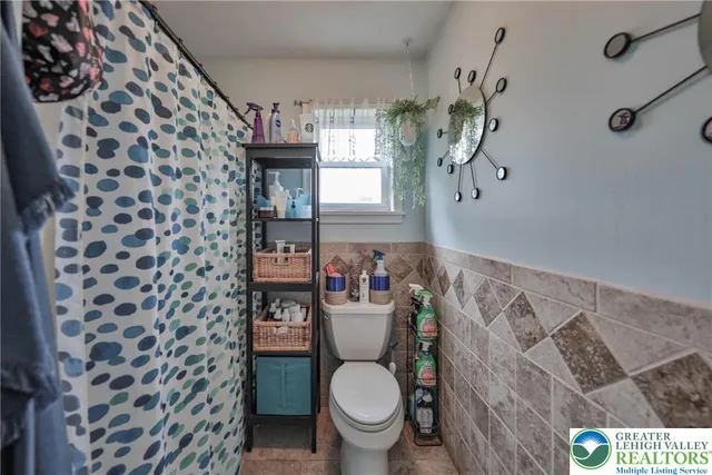 a kitchen with a sink a stove and refrigerator