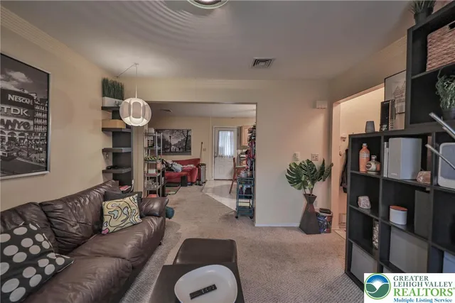 a view of a house with yard and a garden