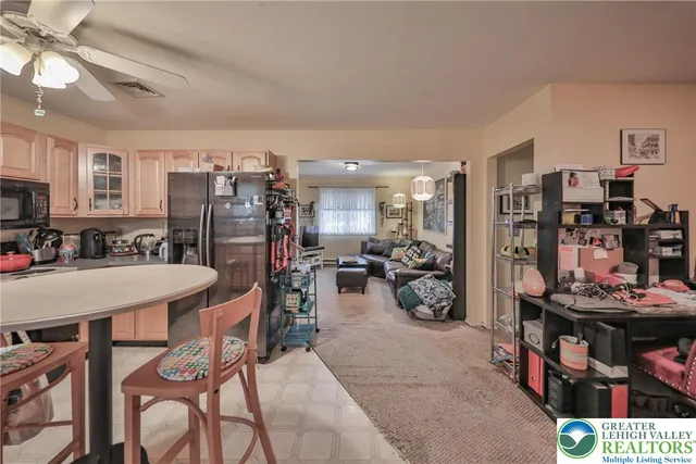 a view of a backyard with swimming pool