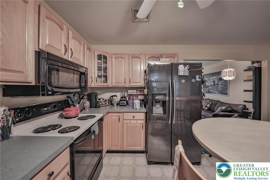 1502 2nd Street Bethlehem, PA 18020 - Photo 45 of 62 a kitchen with a sink a stove and refrigerator