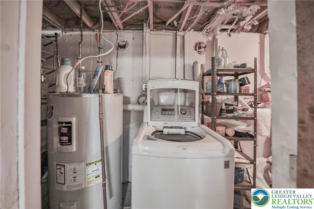1502 2nd Street Bethlehem, PA 18020 - Photo 47 of 62 a kitchen with a refrigerator and a stove