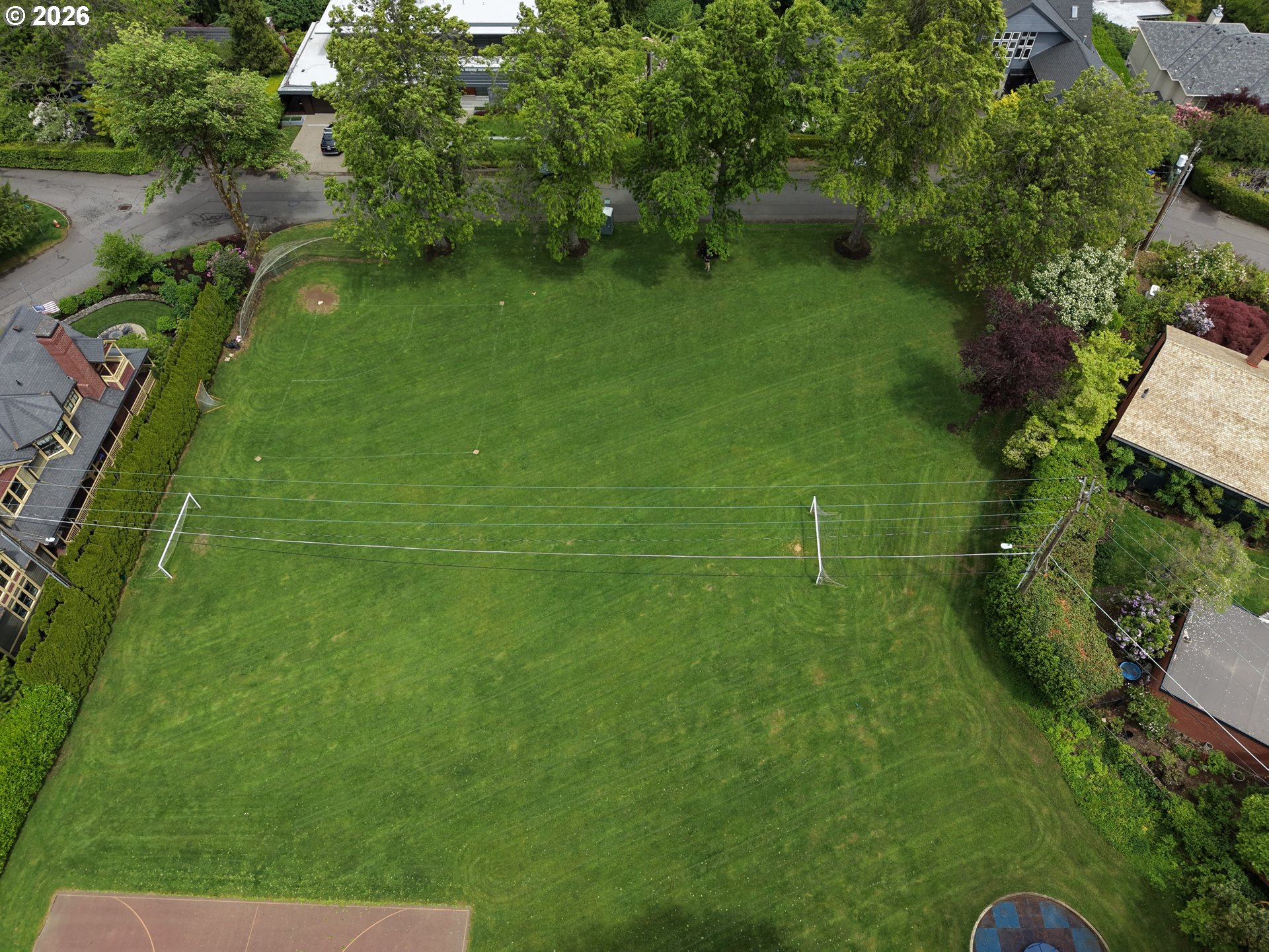 0 Southwest Mcdonnell Portland, OR 97239 - Photo 8 of 17 a green field with lots of trees