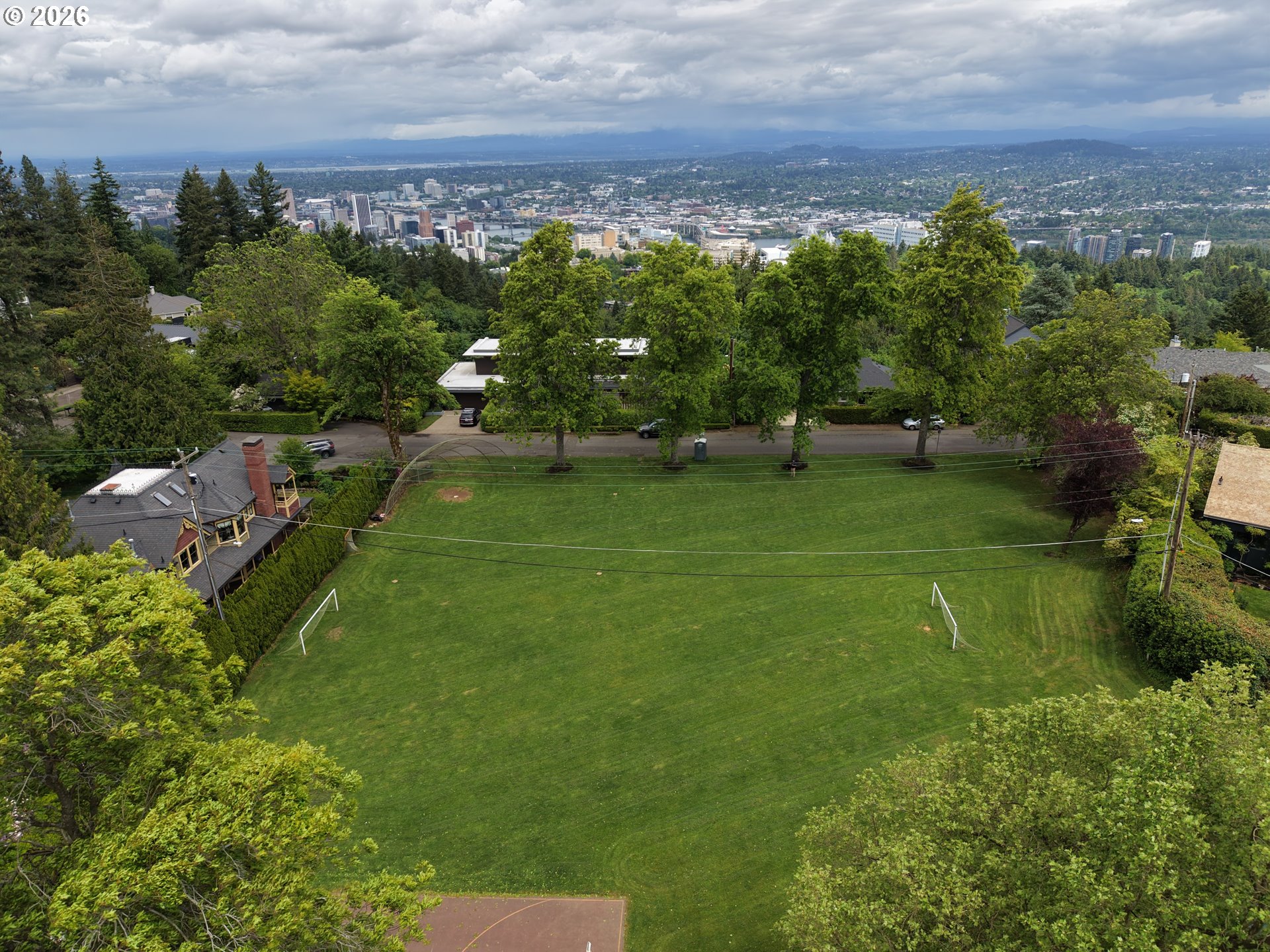 0 Southwest Mcdonnell Portland, OR 97239 - Photo 10 of 17 a view of a golf course with a lake