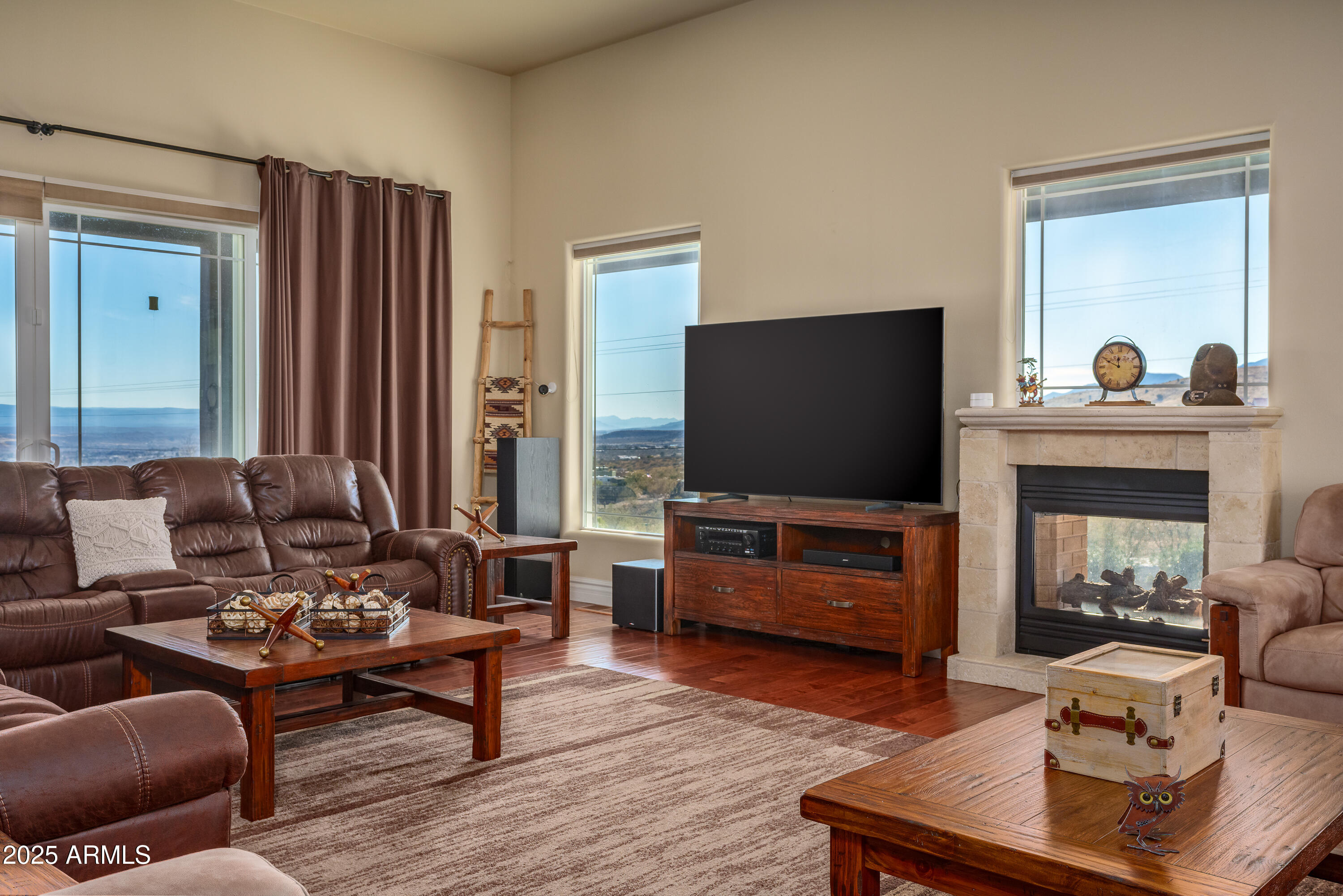 600 North Turquoise Way Clarkdale, AZ 86324 - Photo 14 of 51 a living room with furniture and a flat screen tv