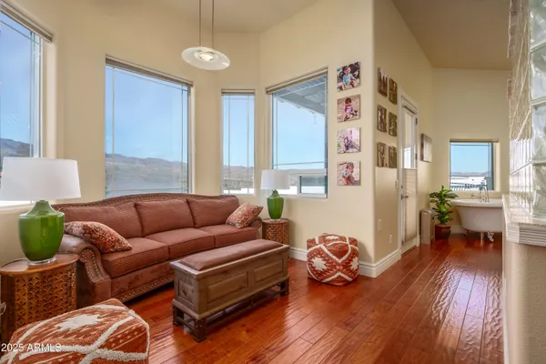 a view of a living room and a fireplace
