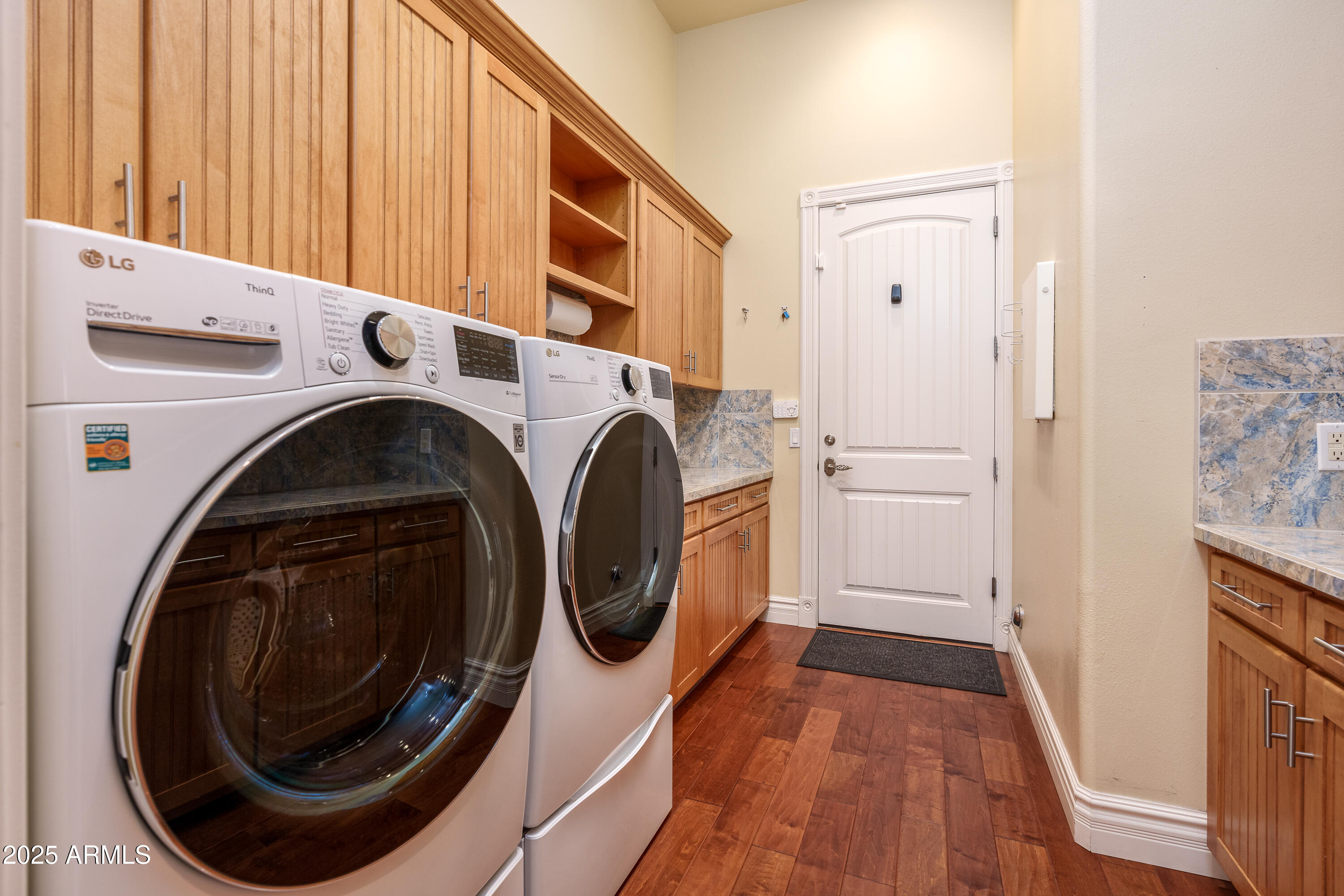 600 North Turquoise Way Clarkdale, AZ 86324 - Photo 37 of 51 a view of a storage and utility room with washer and dryer