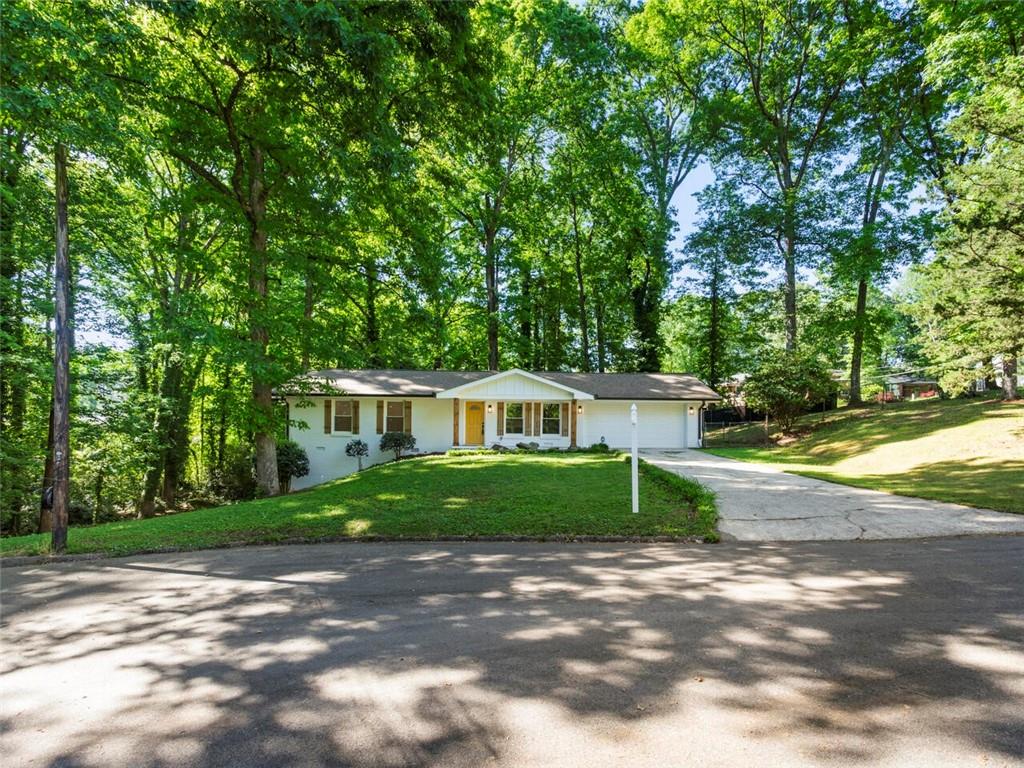 2204 Langdon Court Decatur, GA 30035 - Photo 1 of 1 a front view of a house with a yard