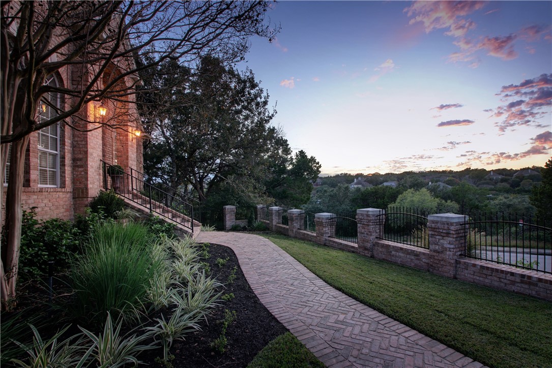 a view of a garden with a bench