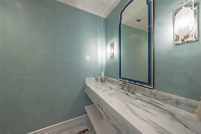 a bathroom with a tub and window