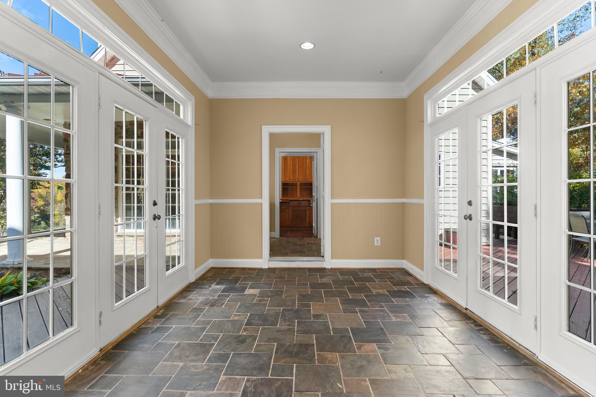 14294 Browntown Road Culpeper, VA 22701 - Photo 28 of 118 Breezeway with French doors to back Patio and froK
