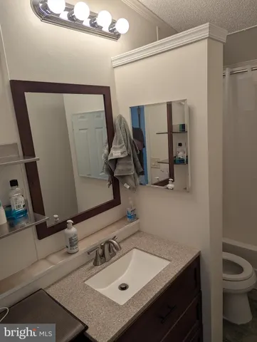 a bathroom with a shower and a bath tub