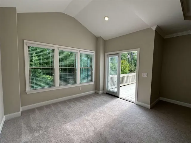 a view of balcony with wooden floor