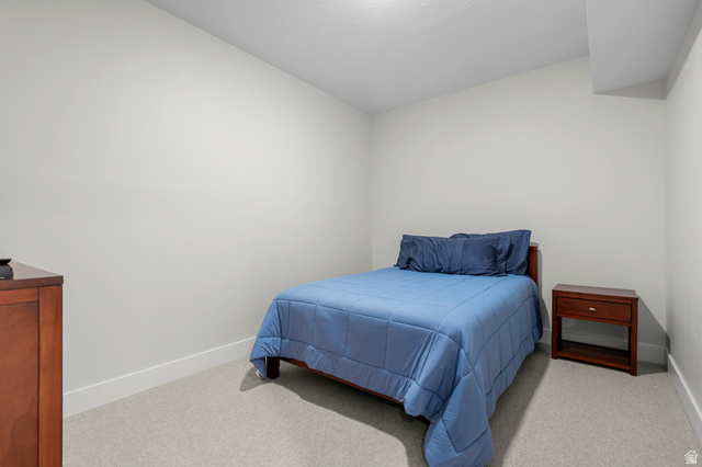 250 South Main Street, Unit 24 Alpine, UT 84004 - Photo 34 of 50 Bedroom featuring light colored carpet