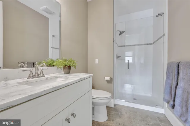 a work room with furniture and a window