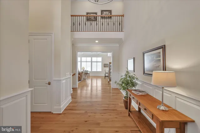 a living room with furniture a fireplace and a table