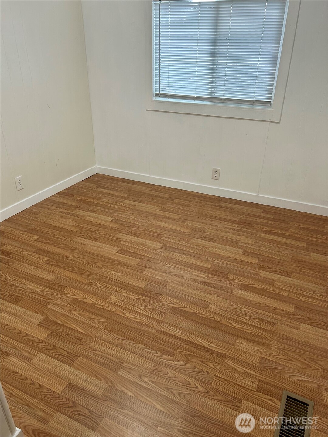 13101 64th Avenue South Seattle, WA 98178 - Photo 25 of 34 a view of a room with wooden floor
