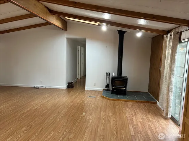 a view of a kitchen from the hallway