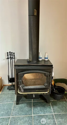 a kitchen with a sink stove top oven and cabinets