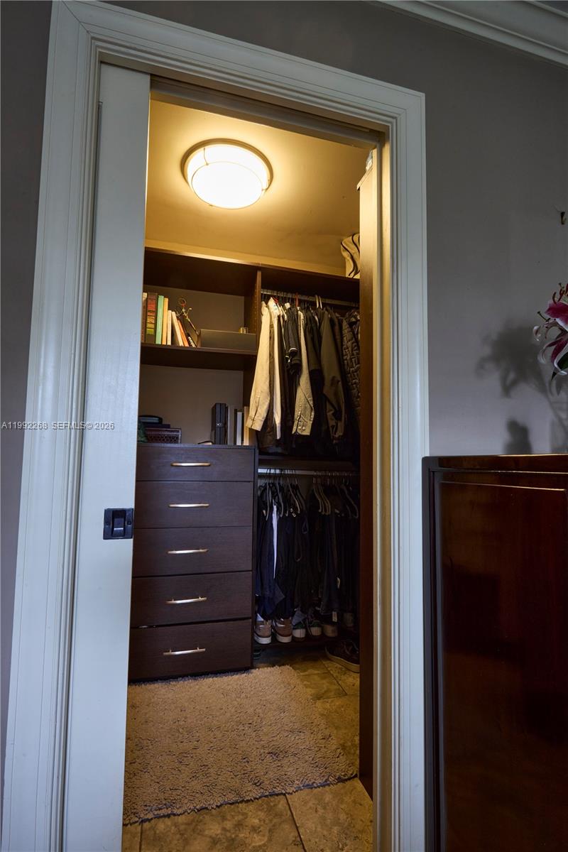 5755 Devonshire Boulevard, Unit 5755 Miami, FL 33155 - Photo 17 of 30 a view of walk in closet